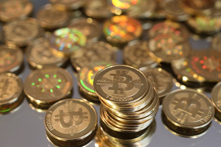 A pile of Bitcoins are shown here after Software engineer Mike Caldwell minted them in his shop on April 26 in Sandy, Utah. Bitcoin is an experimental digital currency used over the Internet that is gaining in popularity worldwide. (Photo by George Frey/Getty images)