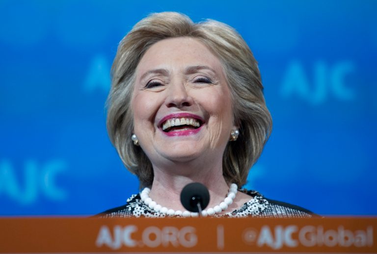 Hillary Clinton smiles as he addresses the American Jewish Committee (AJC) Global Forum closing plenary in Washington. (AP/Cliff Owen)