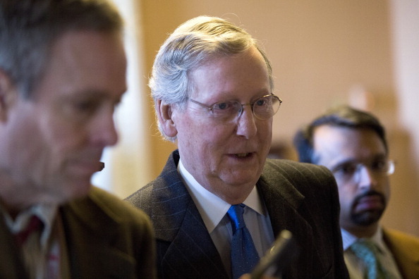 WASHINGTON, DC - DECEMBER 30: Senate Minority Leader Mitch McConnell (R-KY) walks toward his office on Capitol Hill December 30, 2012 in Washington, DC. The House and Senate are both in session today to deal with the looming 'fiscal cliff.' issue. (Photo by Drew Angerer/Getty Images)