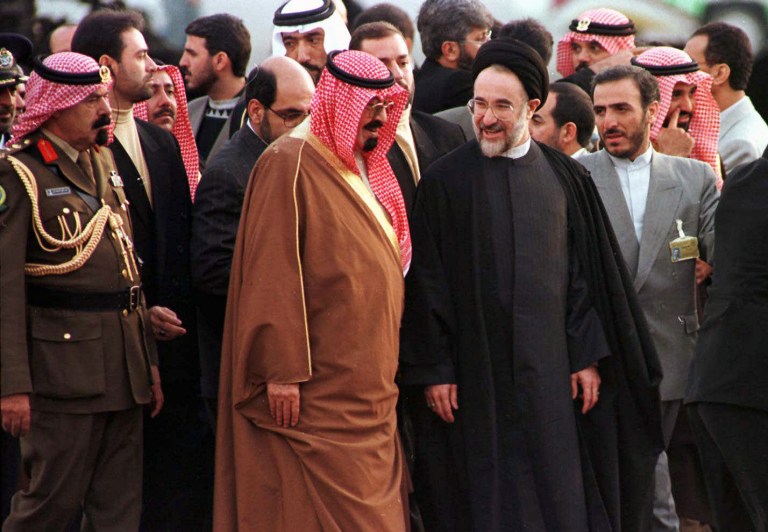 In this Dec. 8, 1997 file photo, Saudi Arabia Crown Prince Abdullah Bin Abdul Aziz Al-Saud, center left, is greeted by Iranian President Mohammad Khatami. (AP Photo/Enric Marti, File)
