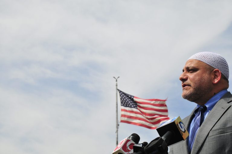 Sr. Imam for the Islamic Society of Greater Oklahoma City Imad Enchassi addresses reporters at a news conference outside of the Oklahoma Republican Party headquarters Wednesday, Sept. 17, 2014 in Oklahoma City. (AP Photo/Nick Oxford)