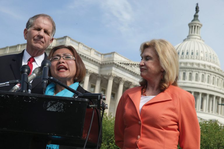 Human trafficking survivor Shandra Woworuntu (C) speaks during a news conference with U.S. House of Representatives Victims' Rights Caucus Chairman Rep. Ted Poe (R-TX) (L) and Rep. Carolyn Maloney (D-NY) outside the U.S. Capitol. (Chip Somodevilla/Getty Images)