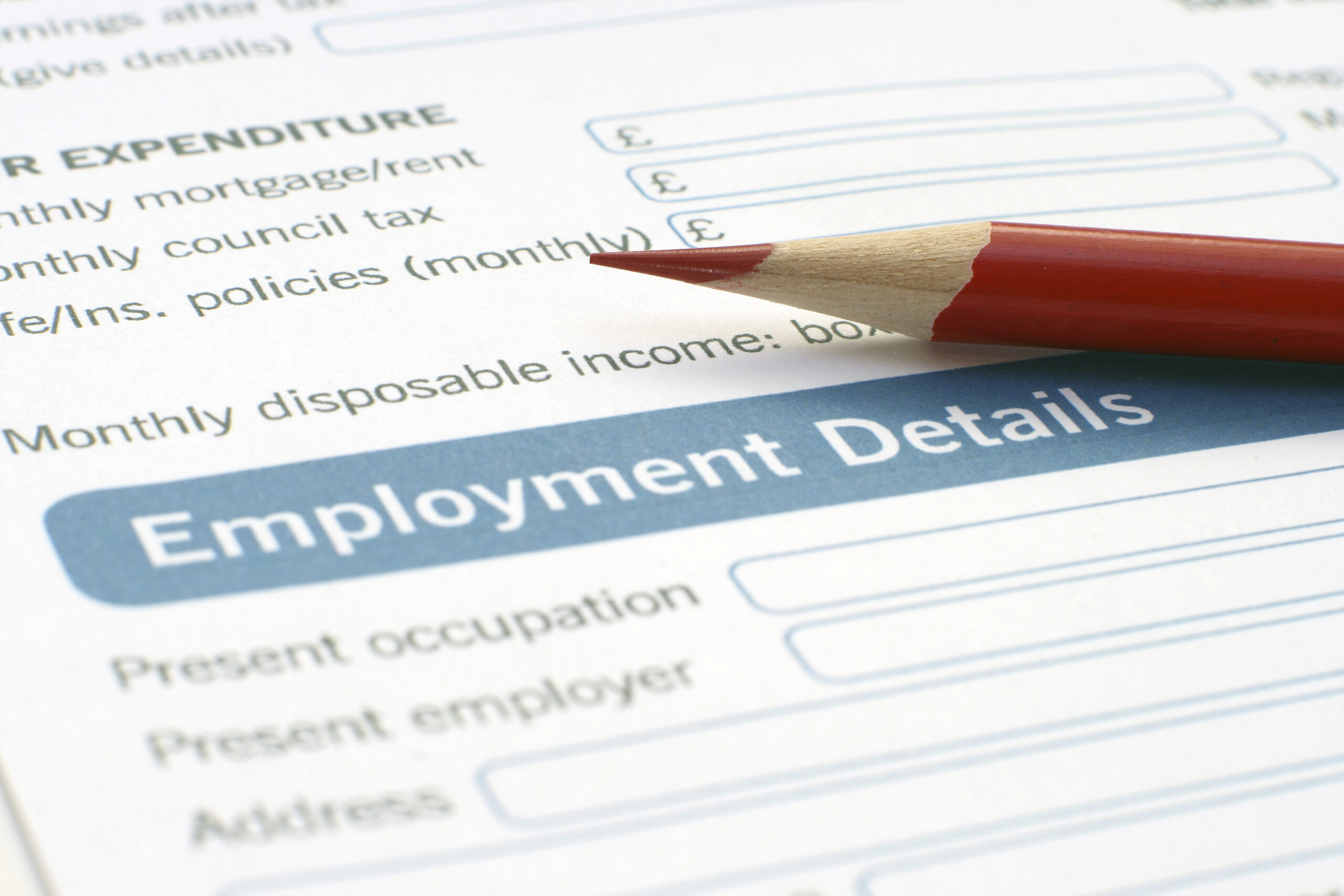 Jobless claims tick down to 294,000
