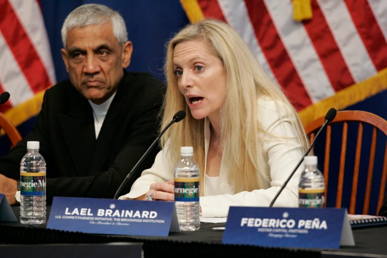Lael Brainard, right, foundering director of Brookings Global Economy and Development Program, sits with Vinod Khosia, left, founder of Khosia Ventures, left, and other business, labor and academic leaders during an economic discussion with Democratic presidential candidate, Sen. Barack Obama D-Ill., in Pittsburgh, Thursday, June 26, 2008. (AP Photo/Keith Srakocic)