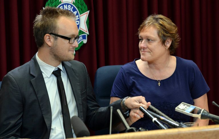 In this March 25, 2014 photo, Kaylene Mann, right, and Jayden Burrows hold hands as they read a statement to the media in Brisbane, Australia, about the loss of Rod Burrows, who is Kaylene's brother and Jayden's father. Rod Burrows was among six Australians killed when Malaysia Airlines flight MH370 crashed into the Southern Indian ocean.  On Friday, July 18, 2014, Mann found out that her stepdaughter, Maree Rizk, was killed along with 297 others on Malaysia Airlines Flight 17, which U.S. intelligence authorities believe was shot down by a surface-to-air missile. (AP Photo/AAP, Dan Peled)  AUSTRALIA OUT, NEW ZEALAND OUT, PAPUA NEW GUINEA OUT, SOUTH PACIFIC OUT, NO SALES, NO ARCHIVE