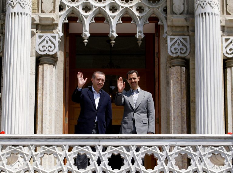   FILE - In this May 9, 2010 file photo, Syrian President Bashar Assad, right, and Turkish Prime Minister Recep Tayyip Erdogan wave to the media before a meeting at the Ottoman-era Ciragan Palace in Istanbul, Turkey. Mustafa Kemal Ataturk, Turkeyâs independence war hero, national founder in a time of crisis, imposer of secular ideas on a mostly Muslim population and a hallowed presence long after his death. The cult of Ataturk, once a staple of Turkish state ideology, is slowly, sometimes imperceptibly, being diluted, replaced in part by the Ottoman imperial era as inspiration for a government with its own set of ideas about modernity, morality and regional stature.(AP Photo/Ibrahim Usta, File)  