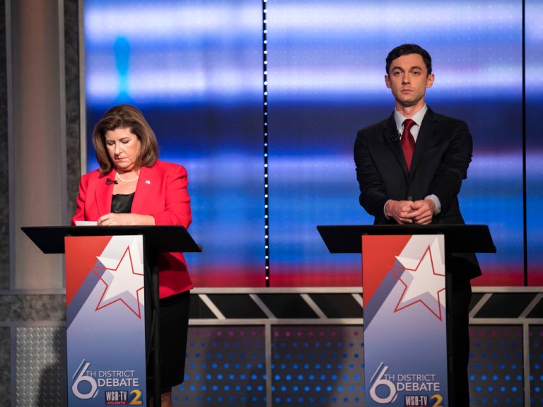 FILE - In this June 6, 2017 file photo, candidates in Georgia's 6th Congressional District race Republican Karen Handel, left, and Democrat Jon Ossoff prepare to debate in Atlanta. Handel and Ossoff are making their last push this weekend before voters in Georgia's 6th Congressional District cast ballots Tuesday, June 20, to replace Tom Price in Washington, a contest seen as an early political test for the Trump administration.
		 (Branden Camp/Atlanta Journal-Constitution via AP)