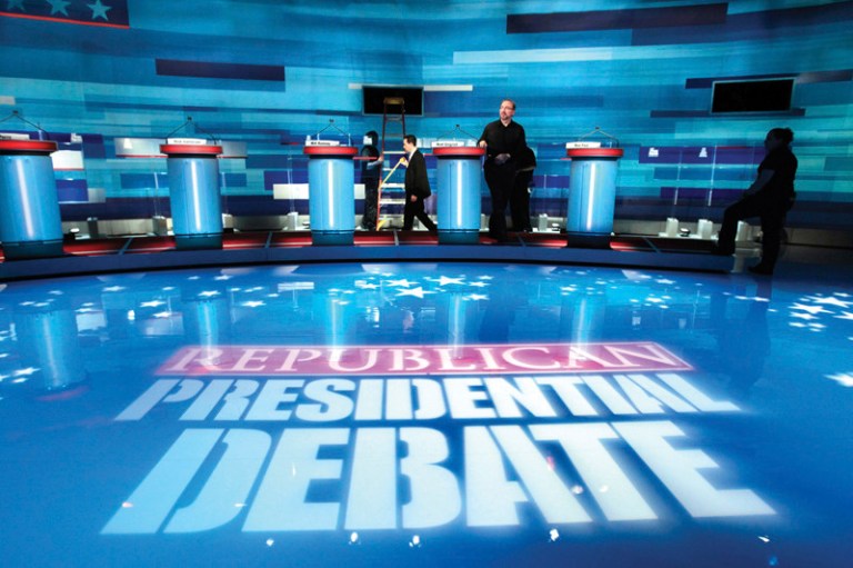 Preparations continue for the FOX News/Wall Street Journal GOP 2012 Presidential Debate. (AP Photo/Charles Dharapak)