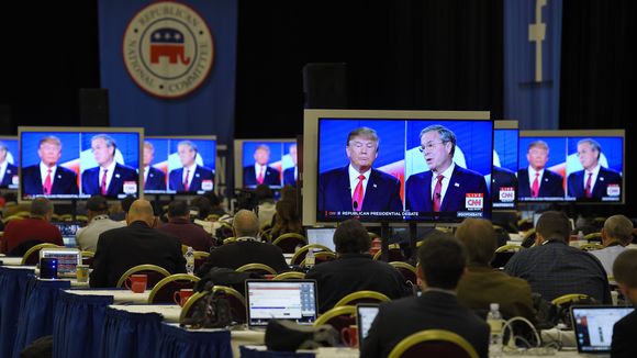 Donald Trump and Jeb Bush are seen on television monitors in the media room during the CNN Republican presidential debate at the Venetian Hotel & Casino on Tuesday, Dec. 15, 2015, in Las Vegas. (Photo: Mark J. Terrill, AP)
