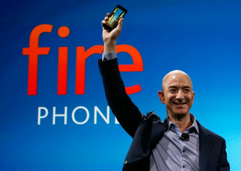 Amazon CEO Jeff Bezos introduces the new Amazon Fire Phone, Wednesday, June 18, 2014, in Seattle. (AP Photo/Ted S. Warren)