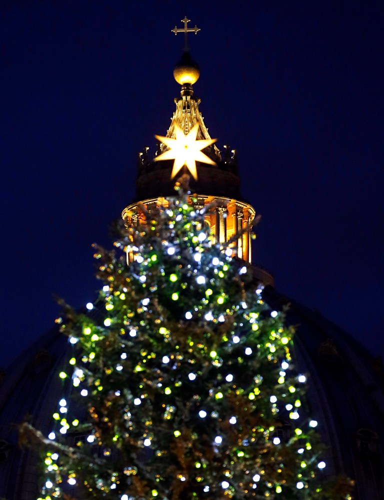   The 24 meters (78.74 feet) Christmas tree is lit in St. Peter's square at the Vatican, Friday, Dec. 14, 2012. The Christmas season kicks off Friday at the Vatican with the traditional lighting of the tree in St. Peter's Square â and a reminder from the Pope about what happened when the 