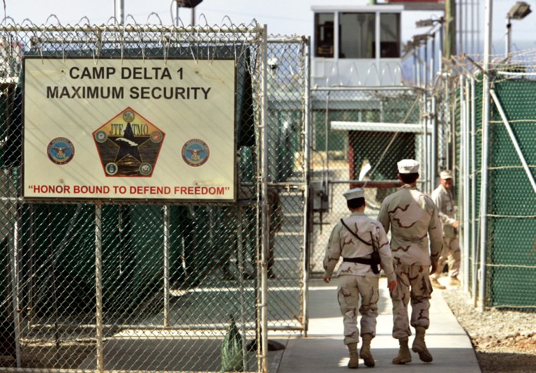 The military judge presiding over the Sept. 11 war crimes proceedings at Guantanamo Bay said in a ruling this week that he will eventually lift his order prohibiting female guards from having physical contact while transporting the five defendants around the U.S. base in Cuba. (AP Photo/Brennan Linsley, File)