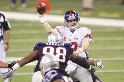 Jeff Gross/Getty ImagesEli Manning led the Giants to their second Super Bowl title in five seasons, with both coming against Tom Brady and the Patriots.