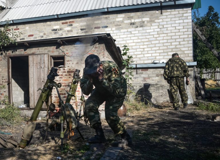 Pro-Russian rebels lead suppressive fire at the positions of Ukrainian army, during shelling in Donetsk, eastern Ukraine, Wednesday, Sept. 3, 2014. A day ahead of a NATO summit, Russian President Vladimir Putin issued his own peace plan for eastern Ukraine, calling on the Russian-backed insurgents there to 