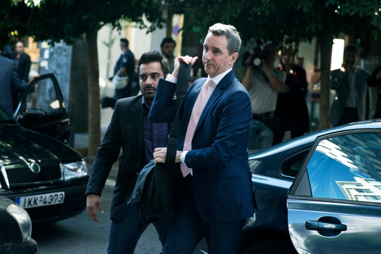 European Commission official Declan Costello arrives at the Finance Ministry in Athens for talks with the Greek government on Tuesday Sept. 30, 2014. Debt inspectors from the European Central Bank, European Commission and International Monetary Fund, which are closely monitoring Greece's harsh austerity program, launched a new round of meetings with Greek officials Tuesday. Talks will focus on Greece's 2015 state budget and implementation of agreed reforms. Greece has depended on bailouts from its European partners and the IMF since it nearly went bankrupt in mid-2010.  (AP Photo/Petros Giannakouris)
