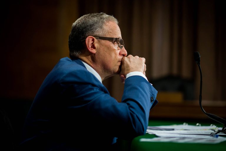 Chairman and President of the Export-Import Bank Fred Hochberg confers with a member of his staff on Capitol Hill, Thursday, June 4, 2015. (Graeme Jennings/Examiner)