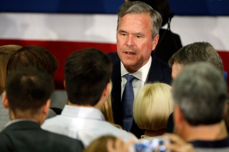 In a possible signal he's staying in the game, Bush slams Trump and offers proposals. (AP Photo/Matt Rourke)