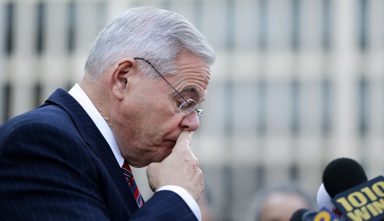 During his remarks to reporters, Menendez thanked supporters and appeared to suggest the trial was motivated by his ethnicity. (AP Photo/Seth Wenig)