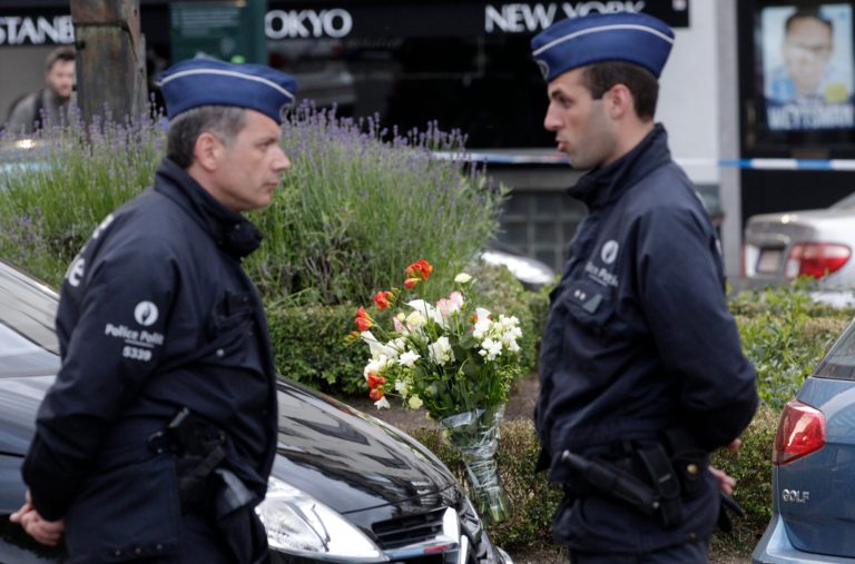 Some flowers were put close to the site of a shooting at the Jewish museum in Brussels, Saturday, May 24, 2014. Three people were killed and one seriously injured in a spree of gunfire at the Jewish Museum in Brussels on Saturday, officials said. The attack, which came on the eve of national and European Parliament elections, led officials to raise anti-terror measures.(AP Photo/Yves Logghe)