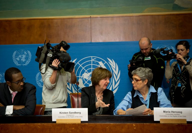Kirsten Sandberg, center, chairperson of the U.N. human rights committee on the rights of the child, talks to committee members Maria Herczog, right, and Benyam Mezmur during a press conference at the United Nations headquarters in Geneva, Switzerland, Wednesday, Feb. 5, 2014.  A U.N. human rights committee denounced the Vatican on Wednesday for adopting policies that allowed priests to rape and molest tens of thousands of children over decades, and urged it to open its files on the pedophiles and the churchmen who concealed their crimes. (AP Photo/Anja Niedringhaus)