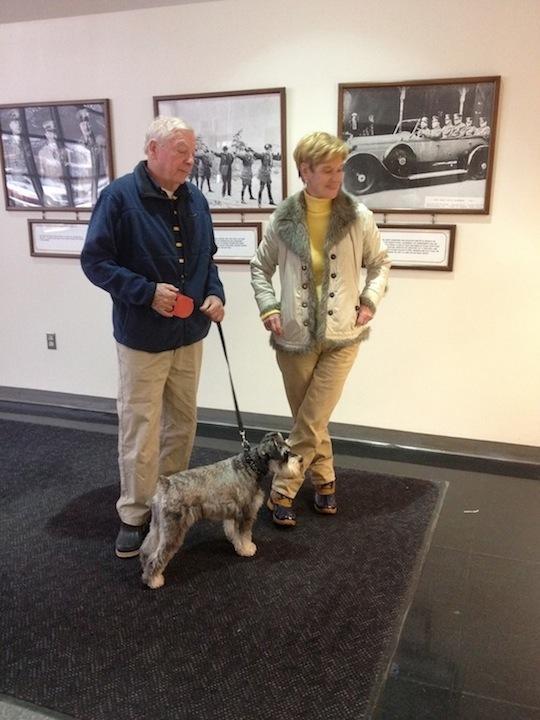 Cody is reunited with his owners after being inside the owners' stolen car in December.