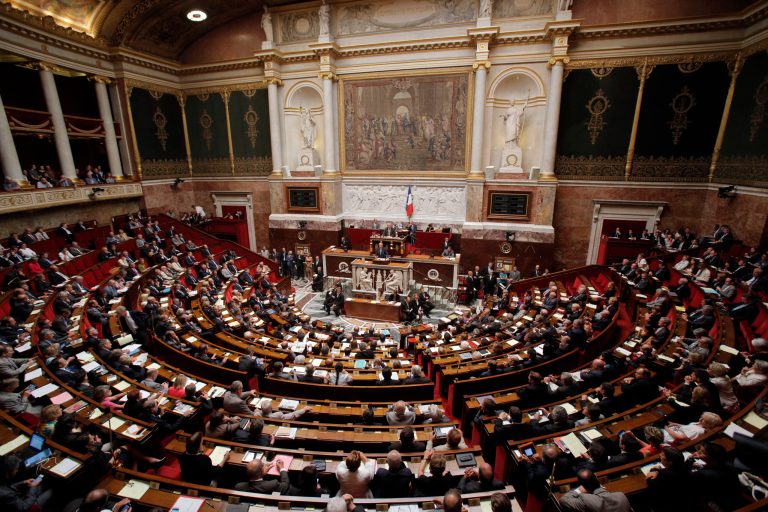 France's Prime Minister Jean Marc Ayrault, center, addressed parliament Wednesday during a debate to rally support for a military strike again Syria. The U.S. and France accuse Assad's Syrian government of using chemical weapons in an Aug. 21 attack on rebel-held suburbs. (AP Photo/Christophe Ena)