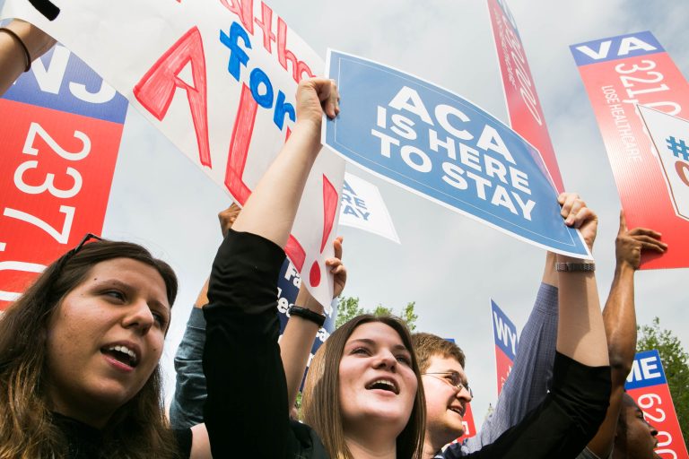 Supporters of the Affordable Care Act celebrate outside the Supreme Court, Thursday, June 25. 2015. (Graeme Jennings/Examiner)