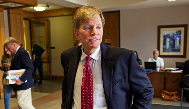 Former Ku Klux Klan leader David Duke praised President Trump for sharing three videos that claimed to show Muslim men murdering a boy and trashing objects representing other religions. (AP Photo/Max Becherer)