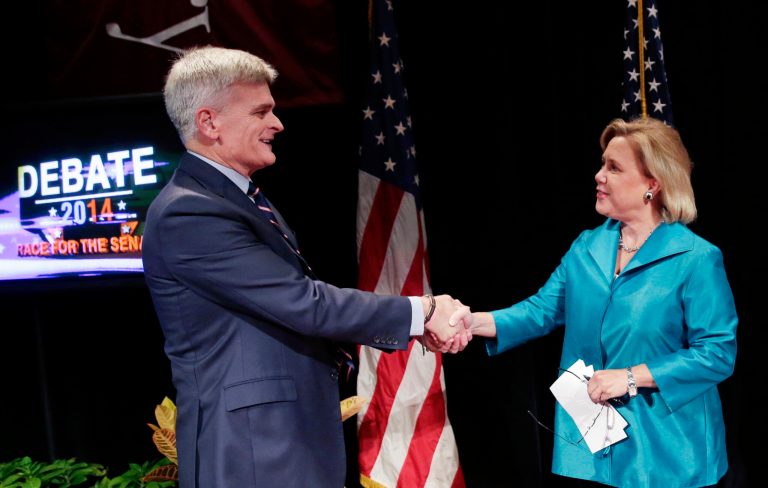 Sen. Mary Landrieu, right, D-La., greets Senate candidate, Rep. Bill Cassidy, R-La., before their debate at Centenary College in Shreveport, La., Tuesday, Oct. 14, 2014. (AP Photo/Gerald Herbert)