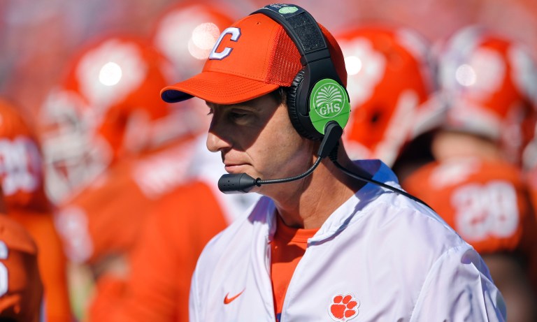 Clemson head coach Dabo Swinney walks the sidelines during the first half of an NCAA college football game against Louisville, Saturday, Nov. 3, 2018, in Clemson, S.C. 