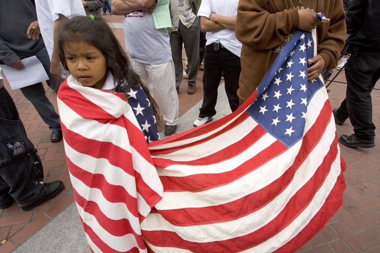 Elena Cabrera, 6, joins supporters of immigration reform during a demonstration in San Francisco, California. (Photo by David Paul Morris/Getty Images, file)