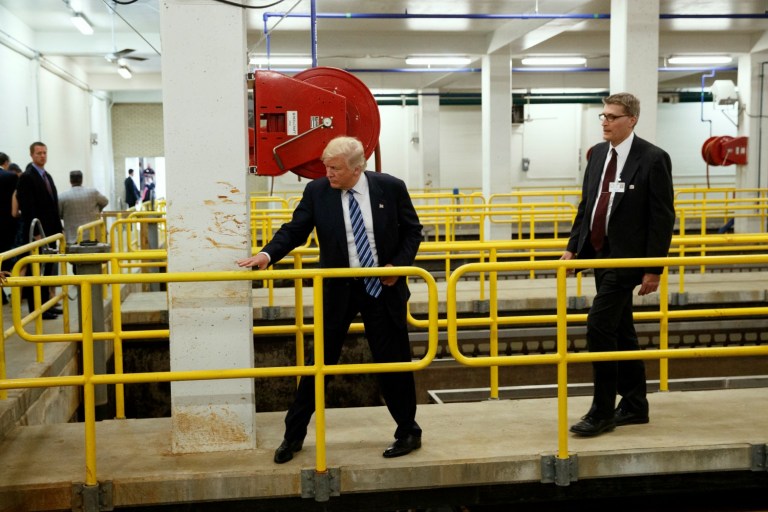 Republican presidential nominee Donald Trump has cut into Democrat Hillary Clinton's lead in Michigan. The poll was also taken right before Trump's stop in Flint, Mich. on Wednesday, which made news after a pastor at a historically black church asked him to stop attacking Clinton during his remarks. (AP Photo/Evan Vucci)