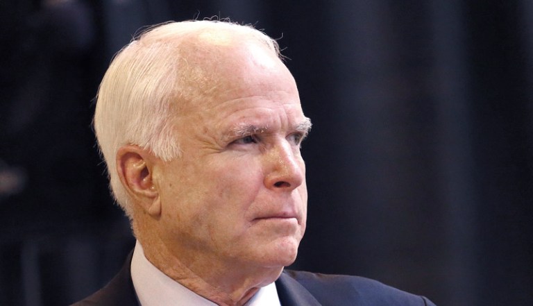 U.S. Sen. John McCain, R-Ariz., speaks to workers at MD Helicopters, Friday, May 30, 2014, in Mesa, Ariz. (AP Photo/Matt York)