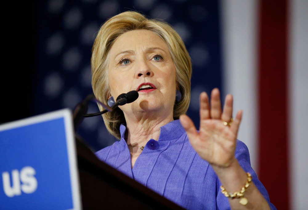 Clinton denounces rally violence, says Trump ‘bad example’