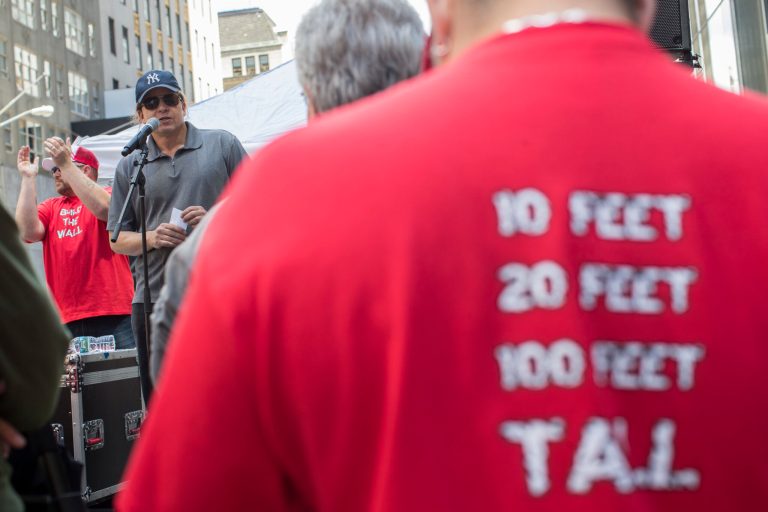 Michael John McCormack, Founder And President, of America First Foundation speaks during a rally near Trump Tower, Saturday, June 3, 2017, in New York. The rally in support of President Trump and his policy to build a wall on the Mexican border was organized by America First Foundation. (AP Photo/Mary Altaffer)