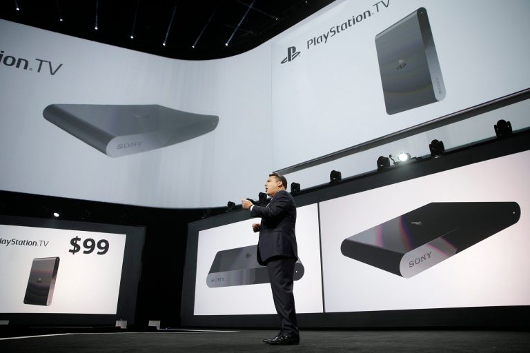 Shawn Layden, president and CEO of Sony Computer Entertainment America, introduces the PlayStation TV during a presentation at the Electronic Entertainment Expo on Monday, June 9, 2014, in Los Angeles. The $99 device will let users stream video, older PlayStation titles and games for Sony's handheld PlayStation Vita system to any TV. (AP Photo/Jae C. Hong)