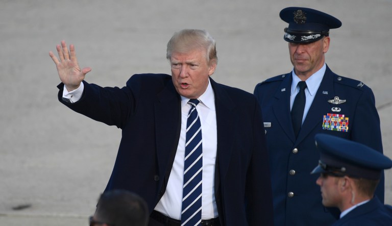 President Donald Trump walks up the steps of Air Force One at Andrews Air Force Base in Md., Saturday, Dec. 2, 2017. Trump is heading to New York to attend Republican fundraisers. (AP Photo/Susan Walsh)