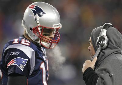 Elise Amendola/AP
Tom Brady and Bill Belichick will be making their fifth Super Bowl appearance with the New England Patriots on Sunday.