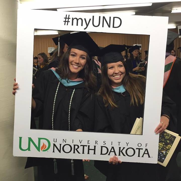 Students celebrate graduation from UND (Facebook).
