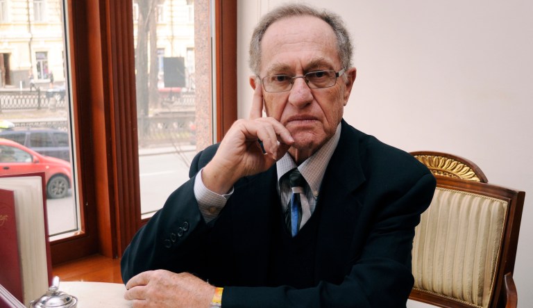 President Trump on Thursday cited famed attorney Alan Dershowitz in an interview with the New York Times to defend himself against accusations that his firing of former FBI Director James Comey on May 9 was an obstruction of justice. (AP Photo/Sergei Chuzavkov)