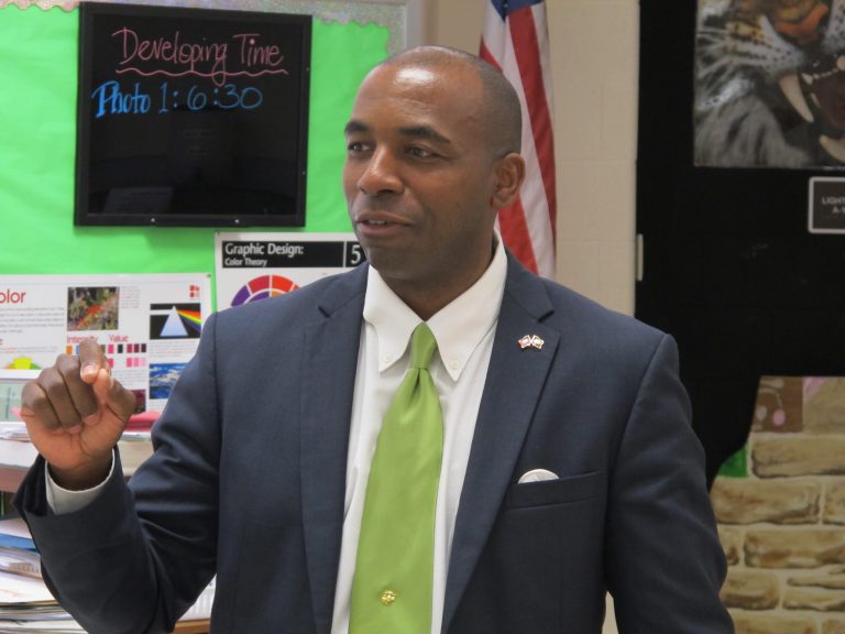 Republican Charles Lollar talks to students in a classroom at Huntingtown High School on Tuesday, May 13, 2014 in Huntingtown, Md. Lollar, who is running in the GOP primary for governor, says cutting taxes is his chief concern.  (AP Photo/Brian Witte)