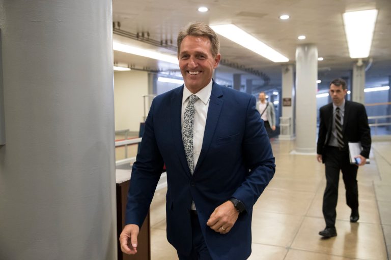 Sen. Jeff Flake, R-Ariz., a member of the Foreign Relations Committee, arrives for the start of a closed-door security briefing at the Capitol in Washington, Wednesday, Oct. 25, 2017. (AP Photo/J. Scott Applewhite)