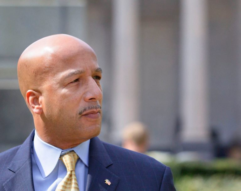 In a Feb. 20, 2013 file photo, former New Orleans Mayor C. Ray Nagin walks past Gallier Hall, the old New Orleans City Hall as he arrives at the Hale Boggs Federal Building and United States District Courthouse to appear in federal court for an arraignment on public corruption charges in New Orleans. Nagin, who led the city during its darkest days after Hurricane Katrina, will be thrust back into the spotlight Jan. 27 when he goes on trial in a corruption case that mushroomed at the end of his eight-year tenure. (AP Photo/Matthew Hinton, File)