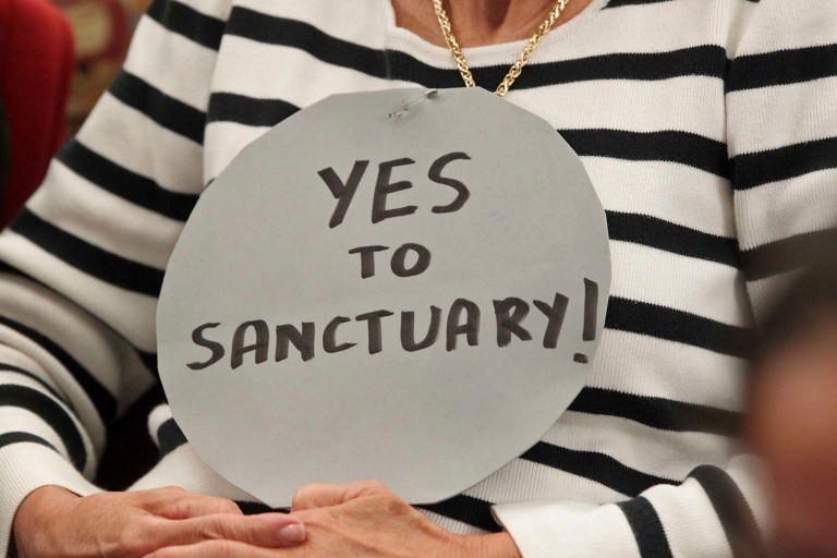 Many immigrants and sanctuary cities are worried after recent arrests. (C.M. Guerrero/El Nuevo Herald via AP)