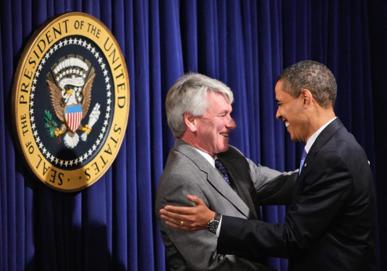 President Obama talks with former White House Counsel Gregory Craig in the Eisenhower Executive Office Building in Washington. (AP/Ron Edmonds)