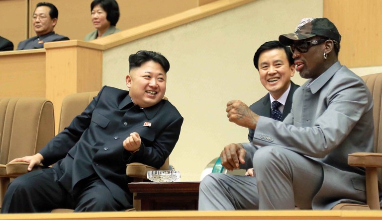 North Korean leader Kim Jong Un talks with former NBA player Dennis Rodman, as they watch an exhibition basketball game in Pyongyang. 