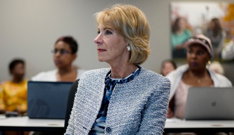 Education Secretary Betsy DeVos travels on a private plane to tour schools and attend events across the country. But unlike other top Trump administration officials, DeVos covers the cost of the travel herself, according to a report. (AP Photo/Nati Harnik)