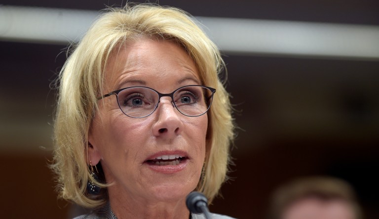 DeVos decided to freeze the rule's implementation in June because of a lawsuit filed in federal court by a California trade association representing for-profit colleges in May. (AP Photo/Susan Walsh)