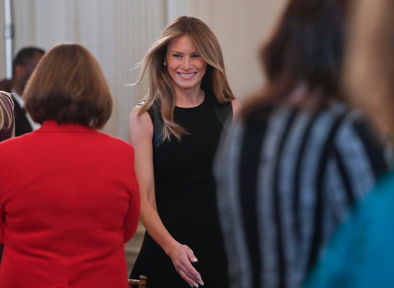 First lady Melania Trump arrives in the State Dining room of the White House in Washington, Wednesday, March 8, 2017, where she hosted a luncheon on International Women's Day. (AP Photo/Pablo Martinez Monsivais)