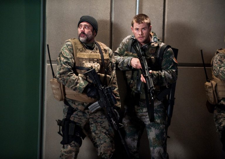 This film image released by Film District shows Jeffrey Dean Morgan, left, and Chris Hemsworth in a scene from 